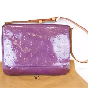 Thompson street shoulder bag Authentic Louis